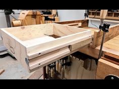 a workbench with lots of wood in it