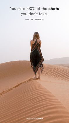 a woman standing in the sand with a quote on it that says, you miss 100 % of the shots you don't take