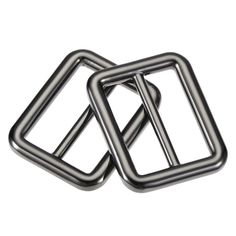 two metal square buckles on a white background