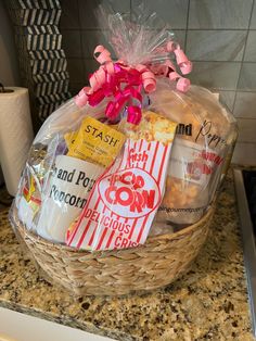 a basket filled with snacks sitting on top of a counter