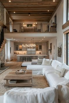 a living room filled with lots of furniture and a fire place in the middle of it