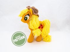 a crocheted pony with yellow hair and a hat on it's head