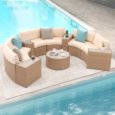 an outdoor patio furniture set next to a swimming pool