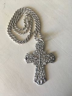 This is a vintage silver 925 unisex Christian Cross. It is hallmarked 925. It is decorated with a beautiful textured pattern. It comes with a thick silver chain. Please contact me if you want a different chain or if you don't want a chain at all! Please contact me for any inquiry you might have! Thank you for visiting Curiose Vintage Shop 🖤 Jordan Cross length: 5.5 cm/ 2.15 inches Chain total length: 48 cm/ 18.9 inches Total weight: 20 gr. It will be sent registered (A class priority) and you w Silver Etched Cross Pendant Necklace, Silver Etched Cross Necklace, Vintage Silver Cross Pendant Jewelry, Vintage Silver Cross Jewelry, Ornate Silver Cross Necklace, Big Cross, Christian Cross, Vintage Shop, A Class