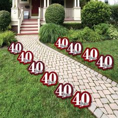 a set of ten yard signs in front of a house with the number forty forty forty forty