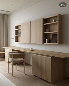 an empty room with a desk, chair and bookcase on the wall next to it