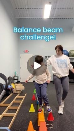 two children are playing with toy cones in an office setting that says balance beam challenge