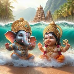 two small statues of elephants sitting on top of a beach next to the ocean with waves