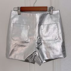 Super Cute Shorts In Fashion Statement Metallic Silver And Faux Leather! New, With Tags By Cloud Ten Fully Lined 2 Front Pockets Hidden Back Zip And Claw Closure Shell, 55% Cotton, 45% Pu Lining, 95% Polyester, 5% Spandex Hand Wash Cold, Line Dry *See Pics For Approximate Measurements All Questions And/Or Offers Are Welcomed! Party Bottoms With Belt Loops And Short Cut, Fitted Party Shorts With Pockets, Faux Leather Shorts With Pockets For Spring, High Waist Faux Leather Shorts With Pockets, High-waisted Party Shorts With Pockets, Faux Leather Short Bottoms For Party, Spring Party Shorts With Belt Loops, Short Faux Leather Party Bottoms, Party Faux Leather Shorts