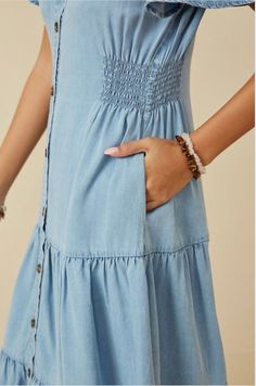 You'll love this, smocked detail button front midi dress! Perfect for all of your any occasion including summer brunch, date nights and even family photos! This beautiful denim dress will become your go-to dress for all things this season. Features a forgiving A-line silhouette with feminine ruffle sleeves that add an extra hint of style. Pair it with heeled sandals for the perfect summer look, or transition to fall by adding some booties and a scarf. Runs slightly big (please choose by size num Tencel Dress, Tencel Denim, Summer Brunch, Brunch Date, Date Nights, Feminine Dress, Ruffle Sleeves, Smock Dress, Heeled Sandals