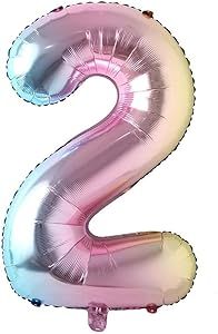 the number 2 balloon is pink and silver