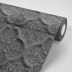 a roll of black paper with ornate designs on it and the words regular price $ 5 99