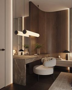 an elegant bathroom with marble counter tops and wooden walls, along with modern lighting fixtures