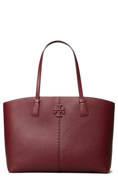 From its elongated handles to the stacked-T logo, the McGraw is the perfect-and spacious-tote for your busy lifestyle. Style Name:Tory Burch Mcgraw Leather Tote. Style Number: 6010725. Available in stores. Classic Tan Tote Shoulder Bag, Tan Textured Leather Shoulder Bag For Work, Classic Tan Bags For Errands, Tan Shoulder Bag With Leather Handles For Work, Classic Tan Shoulder Bag For Shopping, Tan Tote Shoulder Bag For Work, Tan Textured Leather Shoulder Bag For Shopping, Tan Textured Leather Tote Bag, Tan Tote Bag For Workwear