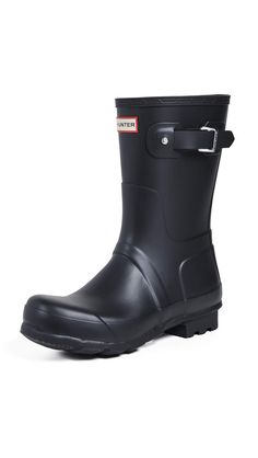 PRICES MAY VARY. The Men's Original Short Rain Boot is a shorter version of the iconic Hunter Original Tall Boot and perfect for wet-weather conditions. Formed of natural rubber, each boot is handcrafted and assembled over three days before being vulcanised for superior protection. The Hunter Original tread pattern and comfortable 100% recycled polyester lining completes the design on this 100% waterproof boot. Pull on Closure 11" Shaft Height 1" Heel Height 100% Vegan Short Rain Boot, Hunter Short, Festival Boots, Short Rain Boots, White Wax, Wellington Boots, Tall Boot, The Hunter, Rain Boot