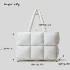 Introducing our Plush Down Puffer Handbag – a perfect blend of style and comfort. Inspired by the timeless down comforter, this shoulder bag offers a luxurious touch in a sleek design. Available in classic white or black, the puffer style makes a chic statement. The main compartment with a secure zipper, a mobile phone pocket, and a zipper clutch bag inside cater to your organizational needs. Crafted with quality polyester lining and cotton filler, this handbag ensures durability and a plush fee Puffer Bag, Women Cotton Dress, Plaid Quilt, Quilted Tote Bags, Zippered Clutch, Quilted Totes, Handbag Women, Mobile Phone Bag, Bag Dress