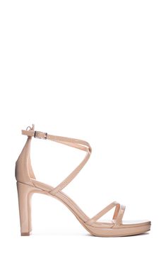 Slim, multidirectional straps lend visual interest to a contemporary sandal lofted by a platform and shaved block heel. 3 1/4" heel Synthetic upper, lining and sole Imported Modern Strappy Heels With Heel Loop, Strappy Heels With Sculpted Heel In Medium Width, Strappy Heels With Sculpted Heel, Modern Strappy Heels With 4-inch Heel, Strappy Sandals With Sculpted Heel In Synthetic Material, Spring Double Strap Sandals With 4-inch Heel, Strappy Sandals With Sculpted Heel, Spring Sandals With Double Strap And 4-inch Heel, Spring Sandals With 4-inch Heel And Double Strap