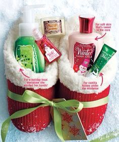 an advertisement for bath and body products in the snow with christmas decorations on it's side