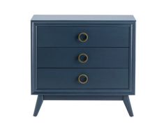 a blue nightstand with three drawers and two brass knobs on the bottom, against a white background