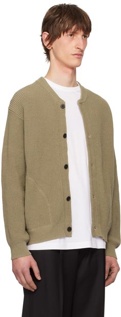 Rib knit cotton cardigan. · Crewneck · Button closure · Seam pockets · Horn hardware Supplier color: Khaki Button-up Knit Cardigan With Pockets, Oversized Cotton Sweater With Button Closure, Knit Button-up Cardigan With Pockets, Knit Button-up Sweater With Pockets, Knit Outerwear With Ribbed Cuffs And Button-up Style, Knit Button-up Outerwear With Ribbed Cuffs, Knit Outerwear With Ribbed Cuffs, Relaxed Fit Knit Cardigan With Buttons, Knit Cardigan With Buttons And Relaxed Fit