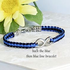 Thin blue line bracelet, Back the blue infinity bracelet, Police jewelry, Law and order jewelry, Infinity bracelet, Macrame bracelet Police Jewelry, Police Support, Back The Blue, Bracelet Macrame, Macrame Bracelet, Law And Order, Macrame Bracelets, Blue Line, Braided Bracelets