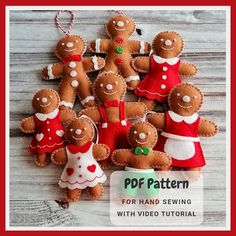 a group of gingerbread men and women ornament hanging on a wooden table