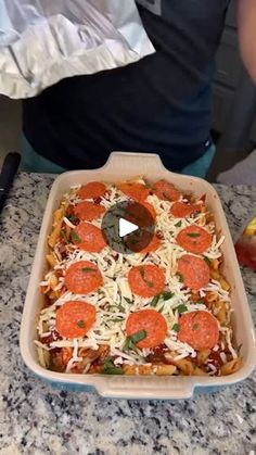 a pizza casserole with pepperoni and cheese on top