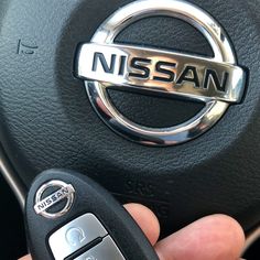 someone is holding the steering wheel button on their nissan car