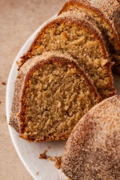 A sliced apple cider donut cake sitting on a serving platter. Carrot Coffee Cake, Gluten Free Thanksgiving Desserts, Apple Cider Donut Cake, Cider Donut Cake, Gluten Free Desserts Thanksgiving, Gluten Free Pumpkin Pie, Nut Cake, Carrot Spice Cake, Cake Form