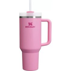 a pink travel mug with a straw sticking out of it's lid and handle