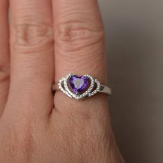 This is a gorgeous handmade creation. Its beauty is its simplicity & Elegance. The 6*6 mm heart cut faceted natural Amethyst is crafted in solid sterling silver and with rhodium plated. All item is sent in a beautiful gift box If you have any idea of design your ring,pls contact me directly. You can realize more lovely stuff clicking the link https://www.etsy.com/shop/knightjewelry?refshopsection_shophome_leftnav Please leave the correct address and you phone number for delivering successful Heart-shaped Crystal Ring With Gemstone As Gift, Heart Cut Amethyst Birthstone Jewelry, Purple Heart Cut Ring For Anniversary, Elegant Amethyst Heart Promise Ring, Heart Cut Gemstone Jewelry For Promise, Heart Cut Amethyst Ring With Accent Stones, Heart-shaped Promise Ring With Accent Stones, Purple Amethyst Heart Cut Ring For Valentine's Day, Amethyst Heart Ring For Valentine's Day Wedding