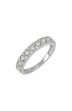 Shimmering pavé illuminates the band of this stackable band cast in dreamy 18-karat white gold. 1 1/4"W x 1/8"L setting Total diamond weight: 0.06ct. Color: G Clarity: VS 18k gold/diamond Imported >Diamond Guide Dazzling White Gold Eternity Band With Pave Setting, Luxury Stackable White Gold Bands, White Gold Diamond Ring With Pave Setting, Luxury Diamond White Stackable Rings With Pave Setting, Luxury White Diamond Stackable Ring, Luxury White Gold Stackable Rings With Pave Setting, Luxury Platinum Stackable Rings With Brilliant Cut, Luxury White Gold Eternity Band With Pave Setting, Fine Jewelry White Gold Stackable Diamond Ring