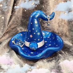 a blue wizard hat with stars on it