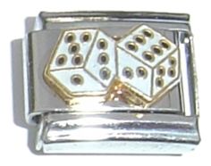 a silver and gold colored belt buckle with dices on it