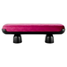 a pink bench with black legs on a white background in the shape of a footstool