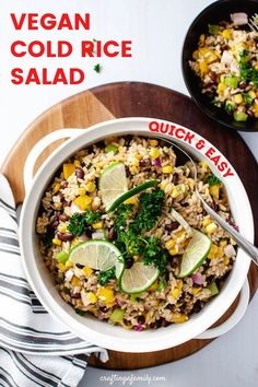 a bowl filled with rice and vegetables on top of a wooden cutting board