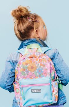 This roomy floral duffle bag  is the perfect bag for sleepovers or vacations and features adjustable straps. Spot Clean Top zip closure Top carry handles Interrior Zip Pocket Made of durable polycanvas Lined in nylon 18" X 10.5" Kindergarten Backpack, Letter Patches, Backpack Patches, Varsity Letter, Go Bags, Travel Duffle, Girls Dream, White Glitter, Girl Backpacks