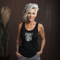 🦋This Mother's Day, gift the freedom of style with the Inked Mom Flowy Racerback Tank - a symbol of her vibrant, free-spirited essence and a salute to moms with a passion for ink on the go.   Manufacturer Information: *65% Polyester 35% Viscose (fiber content may vary for different colors) *Extra Light flowy fabric (3.7 oz/yd² (125 g/m *Relaxed fit for ultimate comfort *Sewn in label for comfort *Runs slightly small *Bella+Canvas 8800 Fabric Blends: *Solid and Heather colors are 65% polyester, 35% viscose *Heather Navy is 70% rayon, 30% polyester Care Instructions: *Machine wash warm, with like colors. *Only non-chlorine bleach when needed. *Tumble dry low heat. *Iron on medium heat if necessary. *Don't visit the realm of dry cleaning.   🌟The Rocker Motherhood - Inked Mom Flowy Racerback Shoulder Length Hair With Shaggy Layers, Edgy Mom Style Rocker Chic, Edgy Pixie Hairstyles, Mohawk Hairstyles For Women, Medium Shaggy Hairstyles, Messy Pixie Haircut, Rocker Hair, Bob Haircut For Fine Hair