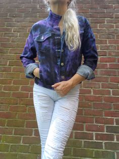 "BLACK & PURPLE Tie Dye Crop Jacket S-XL Boho Jacket, Stretchy Denim Jacket, Street Style, Street Fashion A fun jacket with a good stretch, front buttoning, chest, side & inner pockets. Color Combo Name: DARK NIGHT The modeled size Large jacket is a bit big on my size S/M body - I made it for a customer. Sizes: S, M, L, XL -TRUE TO SIZE! ALWAYS DOUBLE-CHECK THE MEASUREMENTS! Measurements Chest Across: 17½\", 18½\", 19½\", 20½\" Bottom Band Across: 16\", 17\", 18\", 19\" Length: 19½\", 20½\", 20½\", 23\" Sleeves Length: 22½\", 22½\", 23\", 23\" Material 70% cotton, 28% poly, 2% spandex LIGHTWEIGHT STRETCHY FABRIC! Pre-shrunk Machine Wash & Dry Each piece is hand-dyed individually! Although I use the same fabric dyes, the result is always unique and one of a kind! Your order will take 5-7 bu Denim Jacket Street Style, Fun Jacket, Large Jacket, Boho Jacket, Purple Tie Dye, Purple Tie, Cropped Denim Jacket, Tie And Dye, Cool Jackets