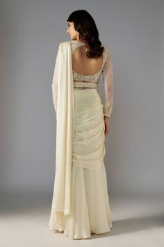 Ivory pre-draped saree in a solid base. Comes with padded blouse embellished by sequin bead floral vine patterns and belt. - Aza Fashions Elegant Silk Pre-draped Saree For Wedding, Elegant Off White Pre-draped Saree With Zari Work, Elegant Off-white Georgette Saree, Cream Pre-draped Saree For Wedding, Elegant Off White Saree For Reception, Elegant Floor-length Silk Blouse Piece, Elegant Off-white Saree Dress, Elegant Cream Georgette Blouse Piece, Elegant White Pre-draped Saree With Traditional Drape