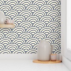 the wallpaper in this kitchen is designed to look like waves