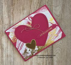 a close up of a card with two hearts on it