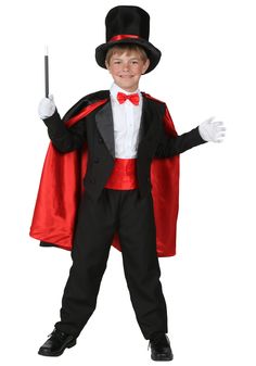 a young boy dressed up in a magician costume and holding a wand with both hands