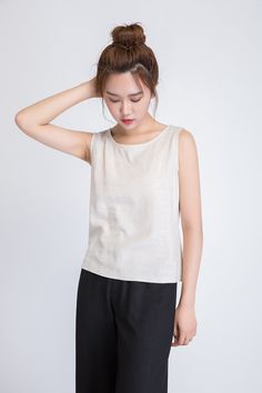 "It's called EveryWear because you can wear this linen tank top... well, everywhere. And we mean everywhere. At the office, happy hour, first dates, second dates, picnics, parties, BBQs, running errands, running 5Ks. You get the idea. DETAILS * 50% linen , 50% cotton blend * Scoop neckline * No zipper * Loose fit * Summer Tank top * Wash by hand or machine with cold water, Ironing after dry * Size Guide https://www.etsy.com/listing/722950722 * SIZE CHART https://www.etsy.com/listing/736810337 * Beige Linen Sleeveless Tank Top, Beige Linen Tank Top For Summer, Beige Sleeveless Linen Top, Casual Flax Linen Tank Top, Everyday Linen Sleeveless Tank Top, Everyday Sleeveless Linen Tank Top, Casual Beige Ramie Tops, Everyday Linen Tank Top, Summer Linen Tops In Flax Color