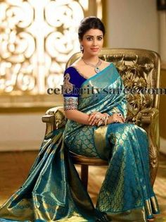 South Indian actress Shriya wearing green and gold colors combination kanjivaram silk saree with gold sari weave rich border, paisley des... Green Kanjivaram Saree, Designer Silk Saree, Bridal Sarees South Indian, Indian Bridal Sarees, Kanjivaram Saree, South Indian Sarees, Designer Silk Sarees, Traditional Indian Dress