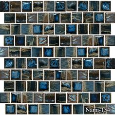 a mosaic tile wall with blue and brown tiles on it's sides, all in different