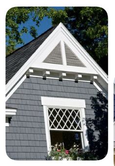 a gray house with white trim and windows