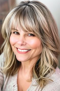 Wavy Lob with Full Bangs Hairstyle for Women Over 40 with Bangs. Hairstyles With Wispy Bangs Medium, Square Haircut With Bangs, Straight Layered Hair With Bangs, Feathered Side Bangs, Long Bob With Bangs Thick Hair, Hairstyles For Long Faces Over 40, Messy Lob With Bangs, Lobs With Bangs, Long Lob Haircut With Bangs