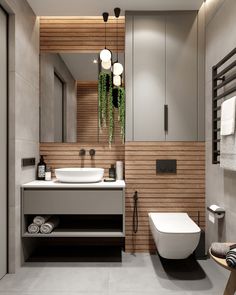 a modern bathroom with wood paneling and white fixtures