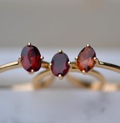 Simple Garnet Ring / Garnet Ring / Silver Garnet Ring / 14k Solid Gold Garnet Ring / Victorian Garnet Ring / Gift For Her / Birthday Gift ☆ Details ☆ * Made of 925 Sterling Silver * Available in 14k Gold Plating, Rose Gold Plating or Rhodium Plated * We use a THICK, DURABLE 14k GOLD plating - for a piece that will last you years to come!  * VERY HIGH QUALITY Main Stone - Natural Garnet Shape - Oval Metal - Select From Options NOTE - Inbox me for the bigger size if it is not available in the size option.            - If You Want we can send you the picture before Dispatch Msg Me For More Info.              - Feel free to contact us, If you have any queries we will happy to help you. ------------------------------------------------------------------------------------------------------------- Gold Garnet Cluster Promise Ring, Yellow Gold Garnet Cluster Ring As Gift, Yellow Gold Garnet Promise Ring, Fine Jewelry Yellow Gold Garnet Ring, Yellow Gold Garnet Ring Fine Jewelry, Yellow Gold Garnet Rings With Prong Setting, Yellow Gold Garnet Rings For Anniversary, Gold Garnet Cluster Ring As Gift, Oval Garnet Ring In Yellow Gold